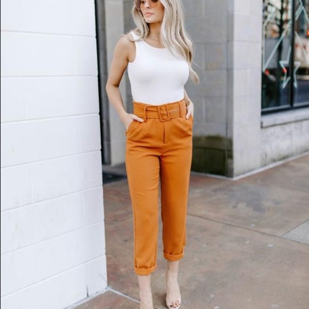 Kittenish orange belted pants